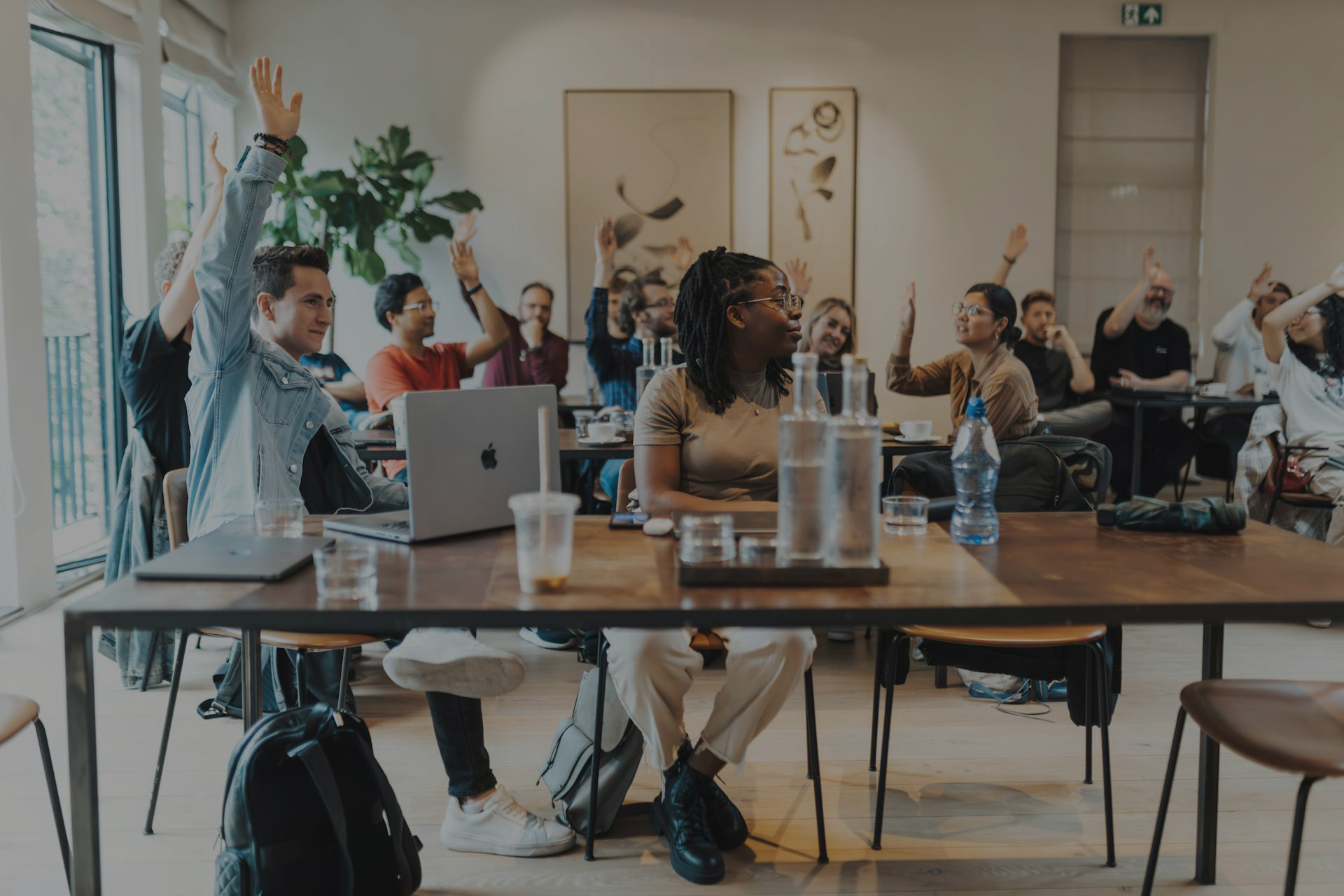 People in a boardroom attending a workshop