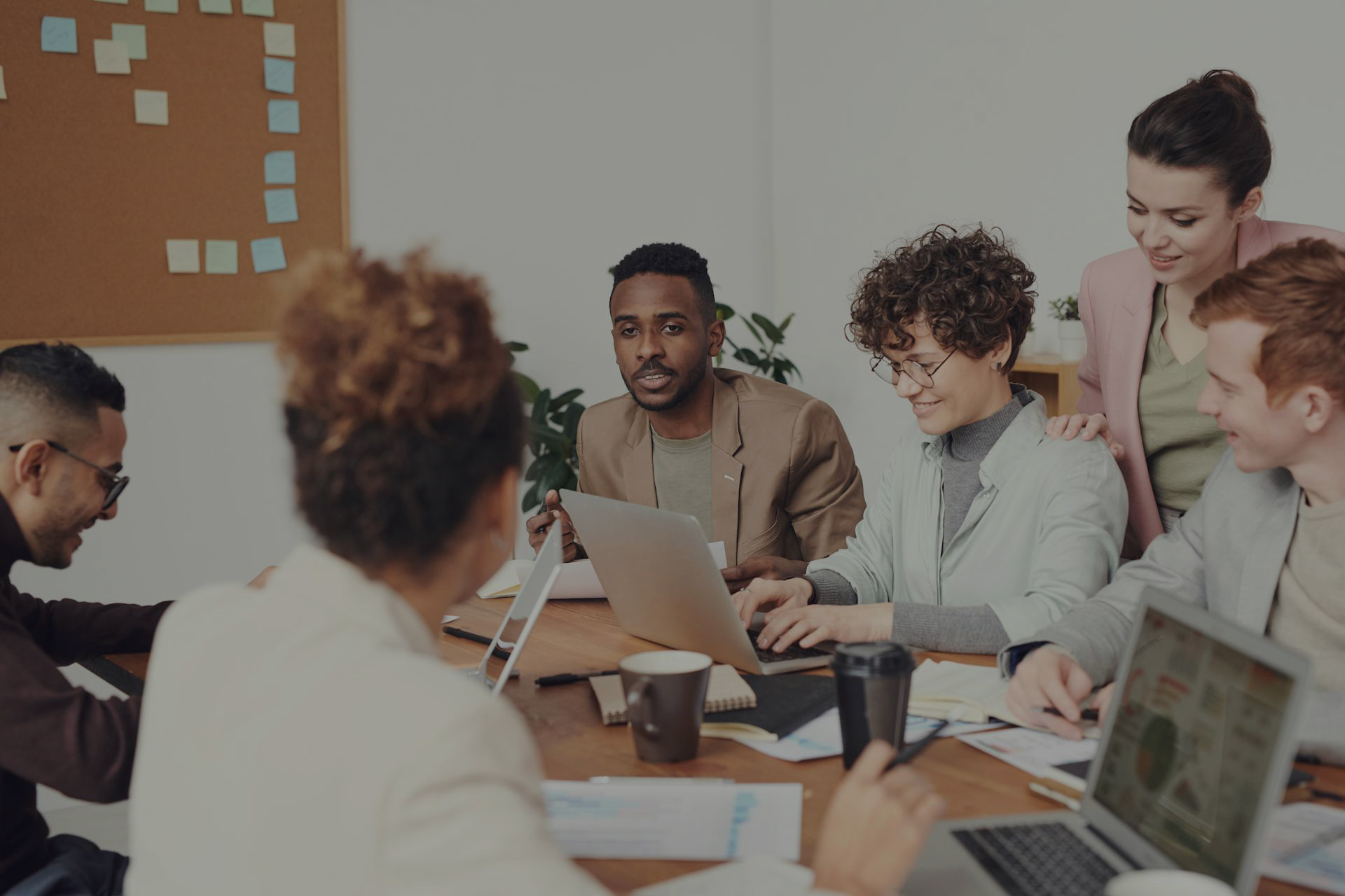 team of diverse people collaborating in a meeting